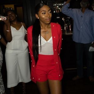 Red suit with pearl detail